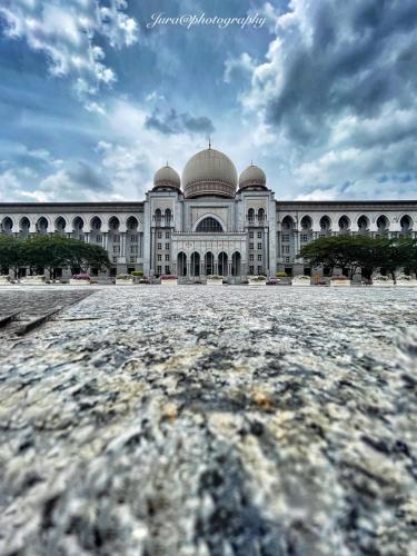 a large white building with a dome on it at Putrajaya Transit Romestay in Putrajaya