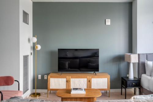 A television and/or entertainment centre at Pioneer Square studio w lounge gym nr bay SEA-587