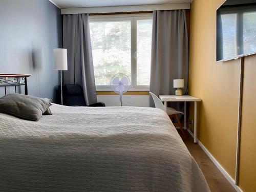 Ένα ή περισσότερα κρεβάτια σε δωμάτιο στο Huttu 2 - Ihqu kaksio mahtavalla sijainnilla