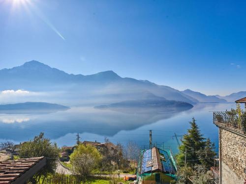 a view of a body of water with mountains at Holiday Home Rustico Simona - GRV255 by Interhome in Gravedona