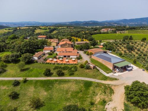 an aerial view of a farm with a building at Holiday Home Ciliegiolo by Interhome in Cinigiano