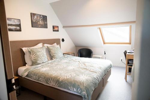 Postel nebo postele na pokoji v ubytování B&B Lievejan