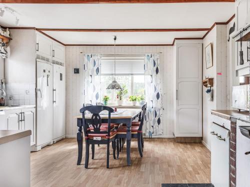 Kuchyň nebo kuchyňský kout v ubytování Holiday Home Enerhögen Flädern by Interhome