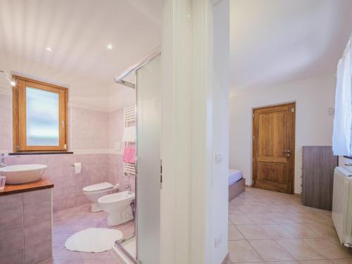 a bathroom with a toilet and a sink and a shower at Holiday Home Villetta Linara by Interhome in Sestri Levante