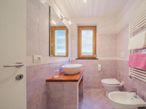 a bathroom with a sink and a toilet at Holiday Home Villetta Linara by Interhome in Sestri Levante