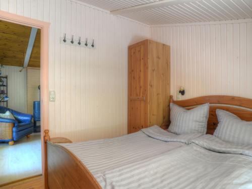 Postel nebo postele na pokoji v ubytování Holiday Home Wiesenhütte by Interhome