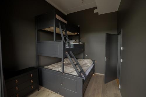 a bedroom with two bunk beds in a room at Elegant apartment in Trysil Alpine Lodge in Trysil