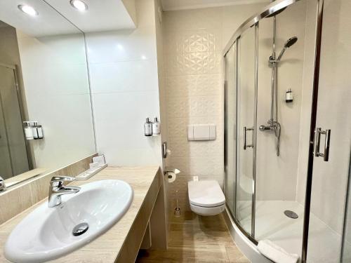 Koupelna v ubytování City Hotel