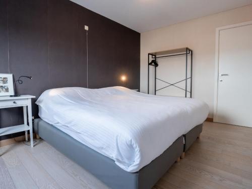 Postel nebo postele na pokoji v ubytování Apartment Duplex by Interhome