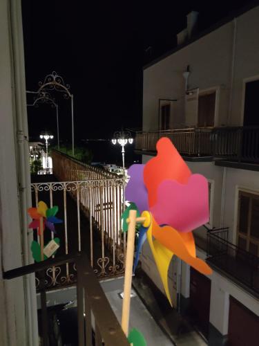 a view of a balcony at night at DIMORA STORICA ALLA ROTONDA in Mottola