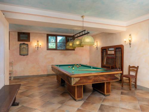 a billiard room with a pool table at Villa La Veduta by Interhome in Grosseto