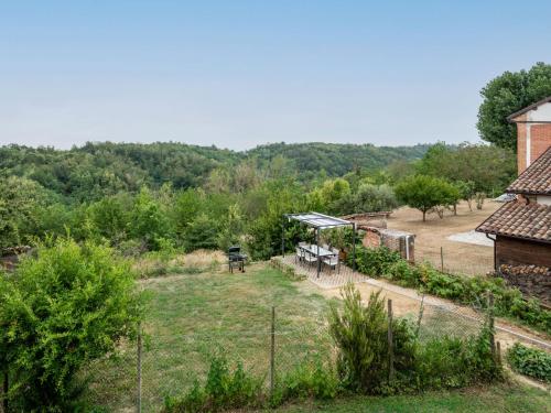 an aerial view of a garden with a picnic table at Holiday Home Vallegra by Interhome in Cortiglione