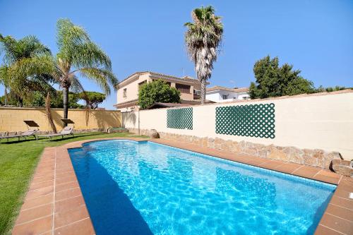 Chalet con piscina en la Barrosa