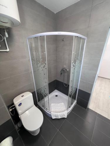 Ванная комната в CRISTAL Home Boutique Apartment 2 - Luminos, Confortabil, Practic, Zona Rezidentiala