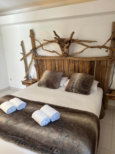 Cama o camas de una habitación en Manade des Baumelles