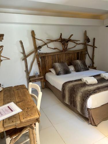 Cama o camas de una habitación en Manade des Baumelles