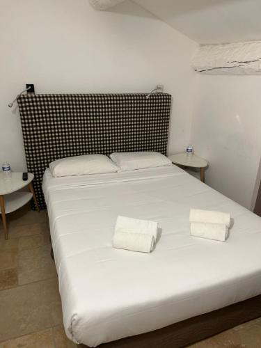 Cama o camas de una habitación en Manade des Baumelles