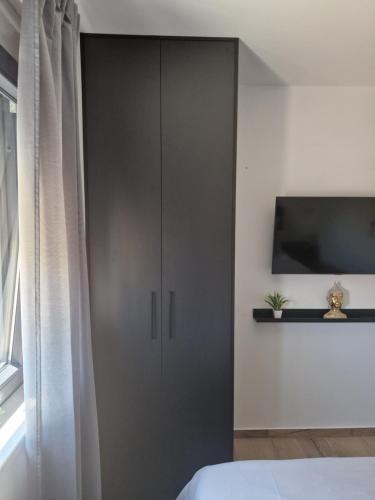 Televisyen dan/atau pusat hiburan di Apartment Luka
