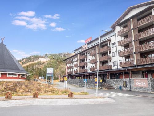 an empty street in front of a building at Holiday Home Ruka ski chalets 46- 1207 by Interhome in Ruka