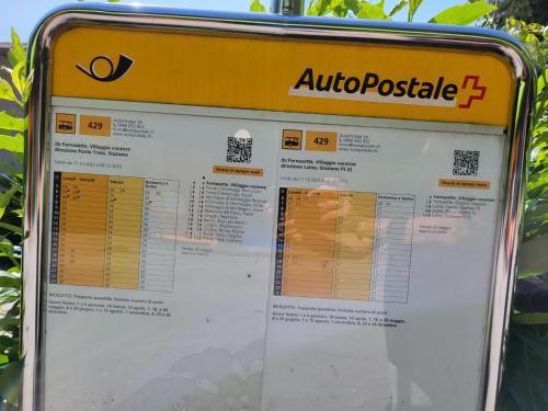 a sign for an auto possible sign on a pole at Chalet Bosco della Bella 6 by Interhome in Termine