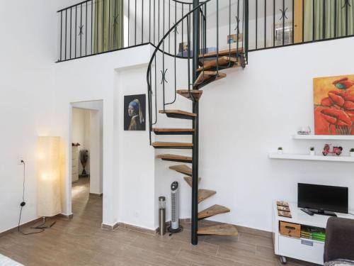 TV a/nebo společenská místnost v ubytování Holiday Home Villa Casalot VI by Interhome