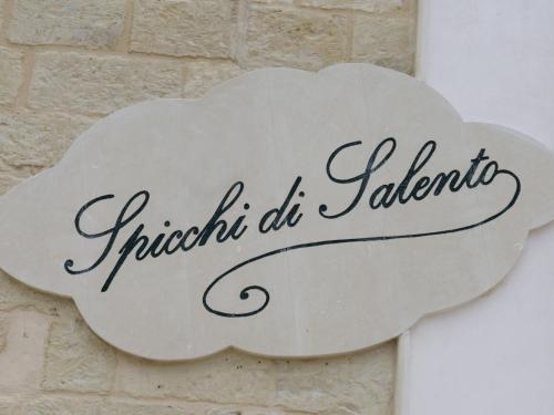 a sign on a wall with the words flush do jabarin at Apartment Spicchi di Salento-3 by Interhome in Vernole