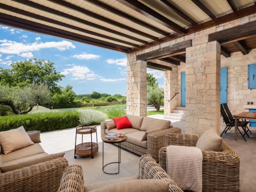 Posezení v ubytování Holiday Home Villa Grando II by Interhome