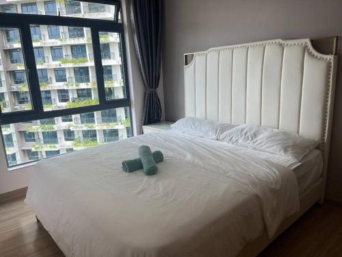 Кровать или кровати в номере Forest city homestay ATARAXIA park 3