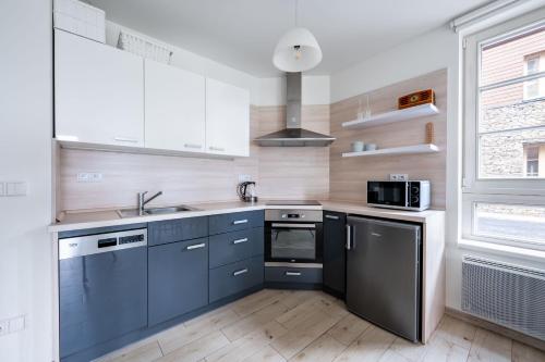 Kuchyň nebo kuchyňský kout v ubytování Horní Mísečky - I3 Pohodlný a teplý apartmán u sjezdovky