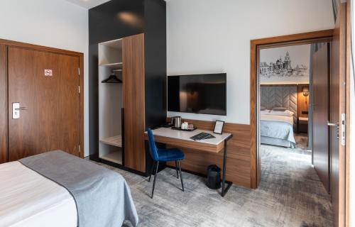 TV a/nebo společenská místnost v ubytování Focus Hotel Premium Kraków