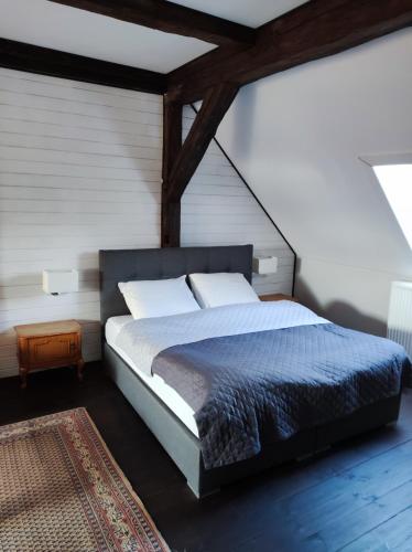 En eller flere senge i et værelse på Srokowski Dwór 1 - Mazurski Dwór - 450m2