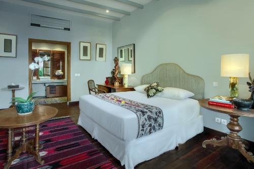 Ένα ή περισσότερα κρεβάτια σε δωμάτιο στο Room & Vespa 3 - Relaxing Stay Center Seminyak
