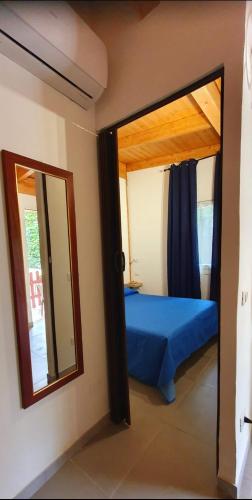 Letto o letti in una camera di Camping Onda Azzurra