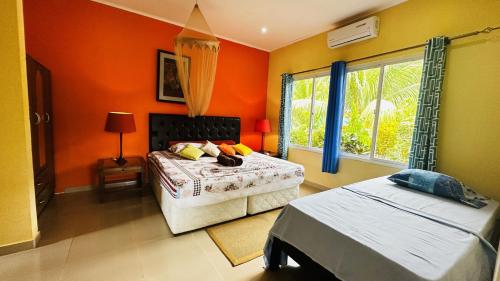 Katil atau katil-katil dalam bilik di Alha Villa