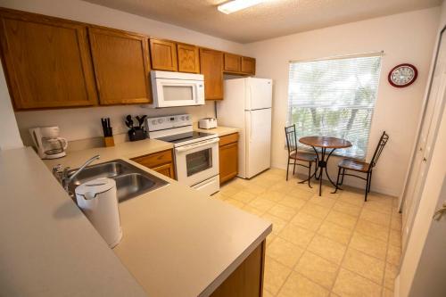 A kitchen or kitchenette at Nicks Southern Dunes Vacation Home