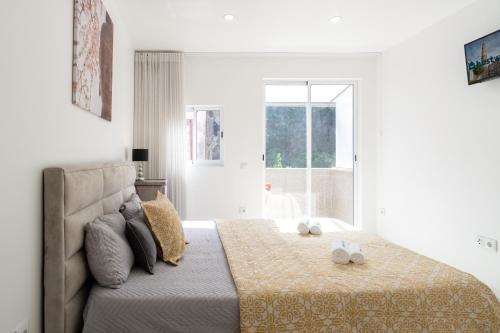 Ένα ή περισσότερα κρεβάτια σε δωμάτιο στο Host Wise - Spacious Noble Apartaments Ace Location