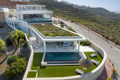 an aerial view of a house with a swimming pool at Exclusiv one in Torrox