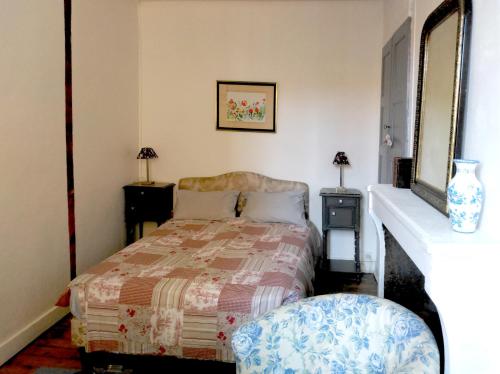 Postel nebo postele na pokoji v ubytování La Suite d'Elise