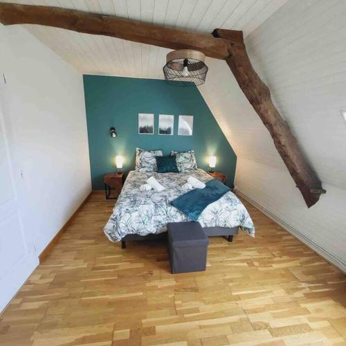 Postel nebo postele na pokoji v ubytování Gîte 200m2 avec spa