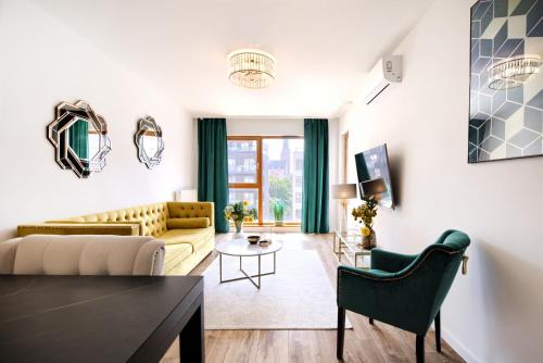 Posezení v ubytování About Art Apartments