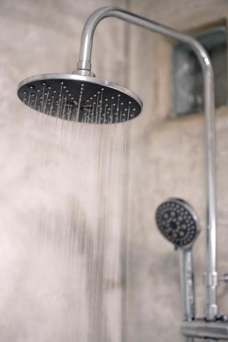 Koupelna v ubytování Ktima Petrina Volia- Maisonette Phos