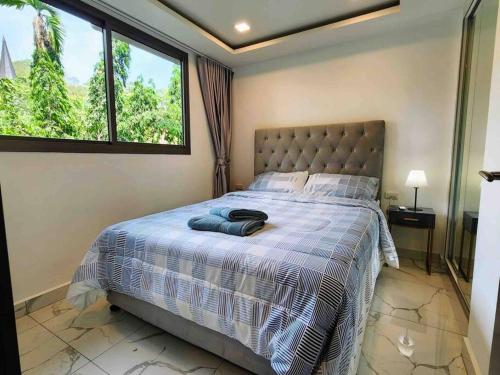 Postel nebo postele na pokoji v ubytování Arcadia Center Suites- Privacy Ultimate Luxury Living