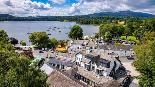 an aerial view of a town with boats in the water at Wateredge Inn- The Inn Collection Group in Ambleside