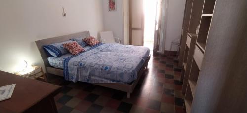 En eller flere senge i et værelse på Luce di Stelle
