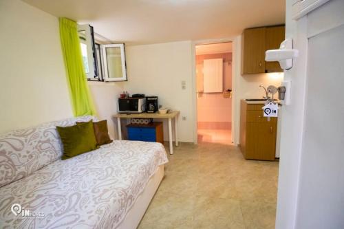 Kuchyň nebo kuchyňský kout v ubytování Odysseus Cozy Home
