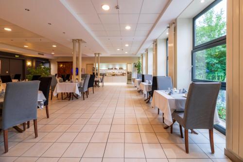 Un lugar para sentarse en HOTEL CERISE - LES SOURCES Luxeuil-les-Bains
