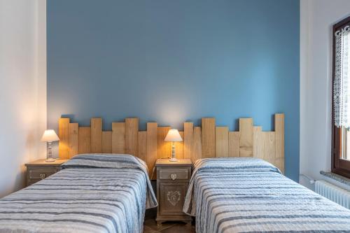 Agriturismo Cantine Bevione - Family Apartmentsにあるベッド