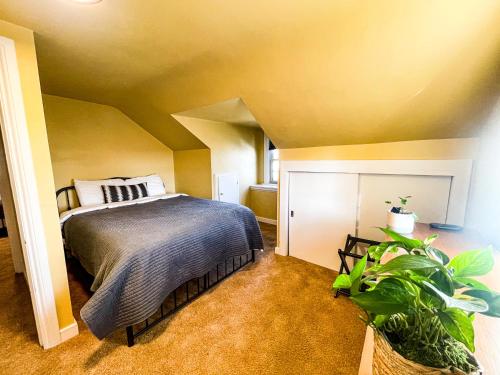 a bedroom with a bed in a room at Charming School House with Large Pool in Huron