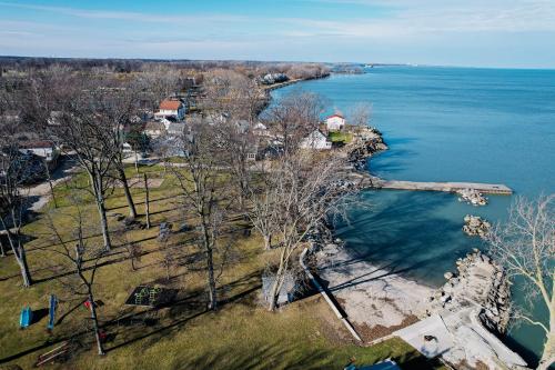 an aerial view of an island in a body of water at Rye Beach Family Cottage in Huron