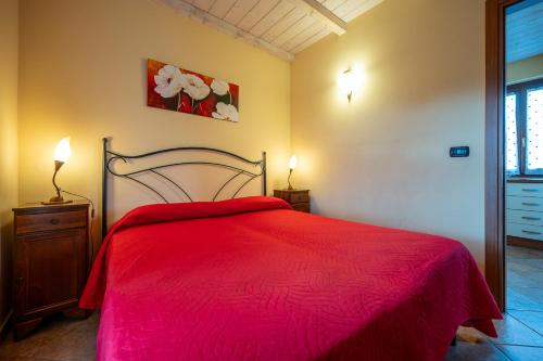 Agriturismo Cantine Bevione - Family Apartmentsにあるベッド